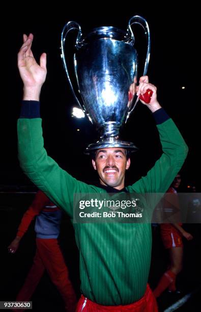 Liverpool goalkeeper Bruce Grobbelaar celebrates with the European Cup after Liverpool's win against Roma 4-2 on penalties in the European Cup Final...