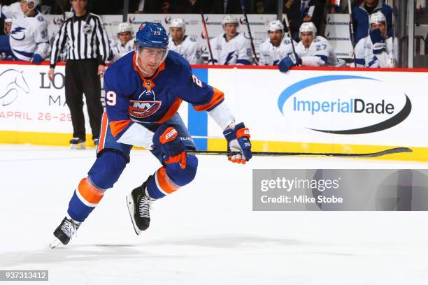 Brock Nelson of the New York Islanders skates against the Tampa Bay Lightning at Barclays Center on March 22, 2018 in New York City. Tampa Bay...