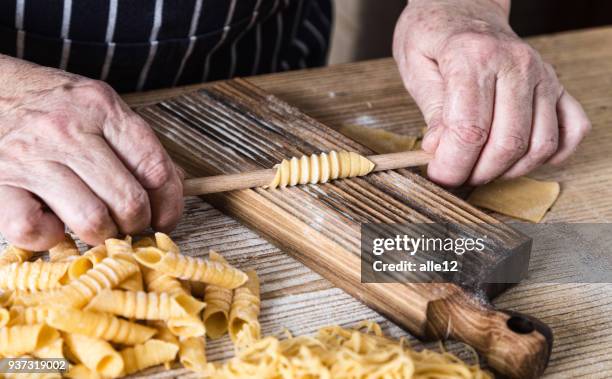 shaping pasta - moulding a shape stock pictures, royalty-free photos & images