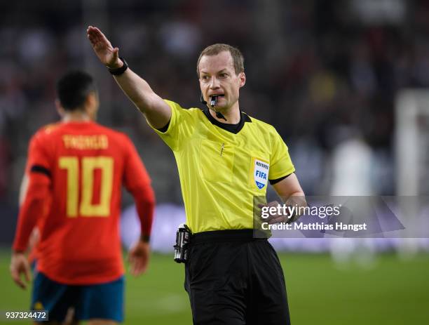 Referee William Collum of Scottland gestures during the international friendly match between Germany and Spain at Esprit-Arena on March 23, 2018 in...