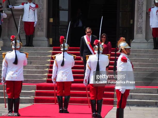 Martin Vizcarra, and his wife Maribel Diaz, in the honor courtyard of Government Palace,receives the salute from the palace guard after taking office...