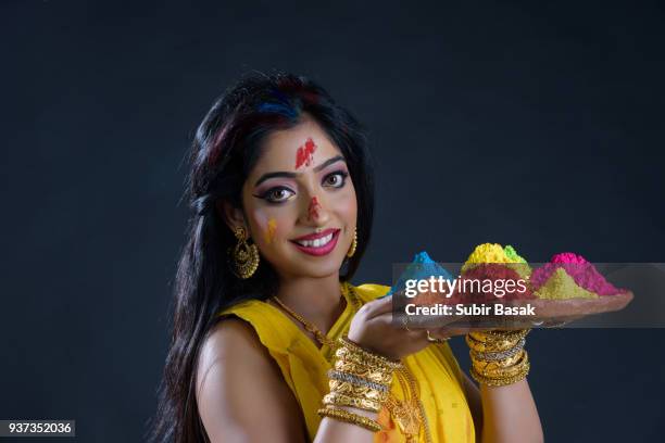 indian woman celebrating holi. - subir basak stockfoto's en -beelden