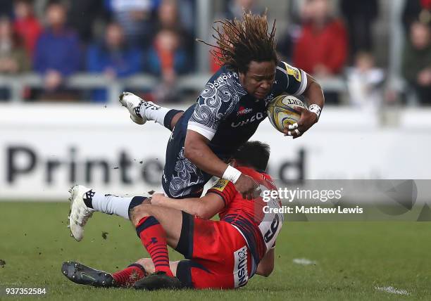 Jonny Arr of Worcester Warriors tackles Marland Yarde of Sale Sharks during the Aviva Premiership match between Sale Sharks and Worcester Warriors at...