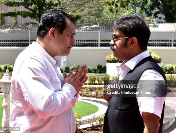 Ameet Satam interacts with Prasad Lad during the budget session at Vidhan Bhavan, on March 23, 2018 in Mumbai, India.