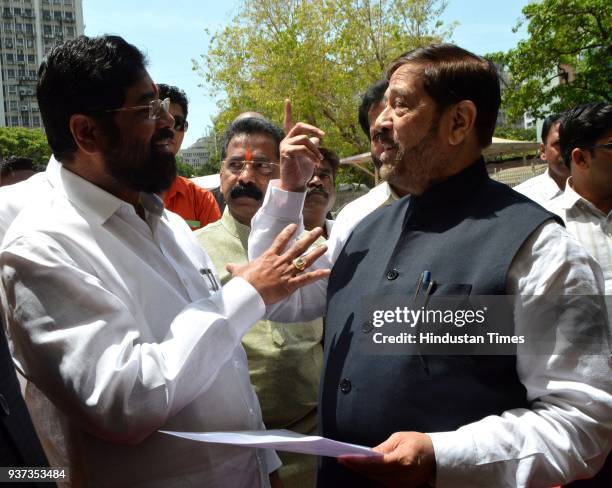 Girish Bapat interacts with Eknath Shinde during the budget session at Vidhan Bhavan, on March 23, 2018 in Mumbai, India.