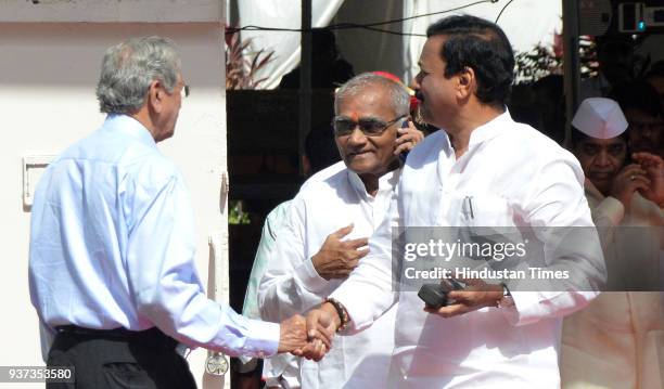 Subhash Desai interacts with Sunil Tatkare during the budget session at Vidhan Bhavan, on March 23, 2018 in Mumbai, India.