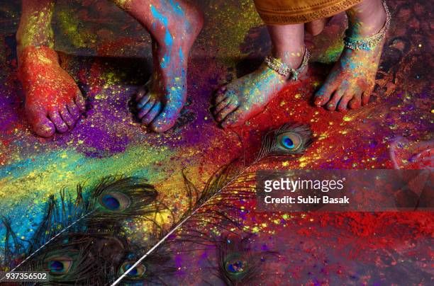 couple celebrating holi with colors and musical intruments. - subir basak stockfoto's en -beelden