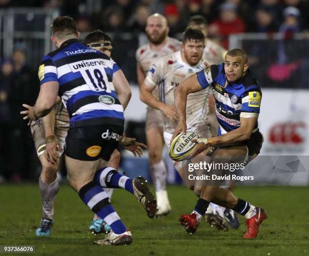 Jonathan Joseph of Bath passes the ball during the Aviva Premiership match between Bath Rugby and Exeter Chiefs at the Recreation Ground on March 23,...