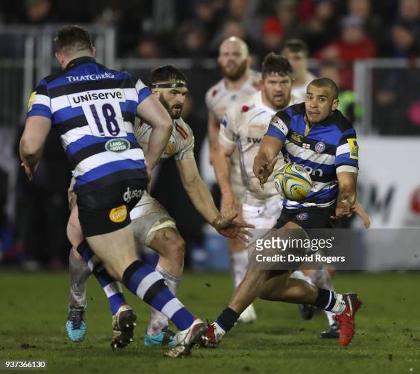 Jonathan Joseph of Bath passes the ball during the Aviva Premiership match between Bath Rugby and Exeter Chiefs at the Recreation Ground on March 23,...
