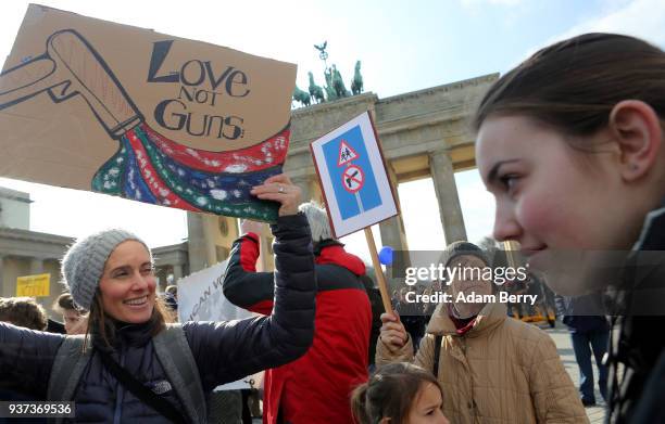 Demonstrators protest at the March for our Lives demonstration on March 24, 2018 in Berlin, Germany. The protest in Berlin was intended to show...