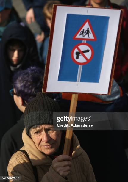 Demonstrators protest at the March for our Lives demonstration on March 24, 2018 in Berlin, Germany. The protest in Berlin was intended to show...
