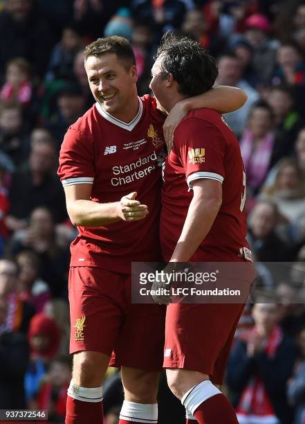 Michael Owen of Liverpool celebrates the second goal during the LFC Foundation charity match between Liverpool FC Legends and FC Bayern Legends at...