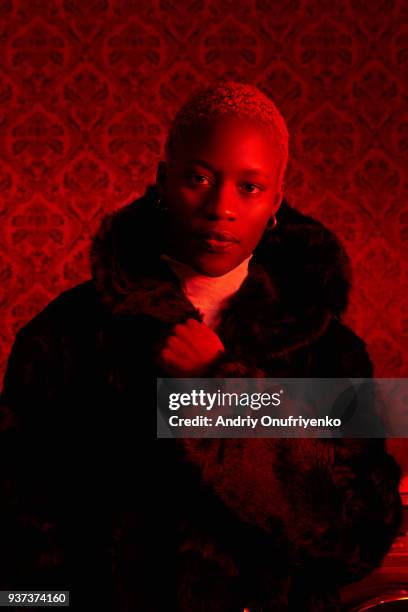 Portrait of young woman in neon light