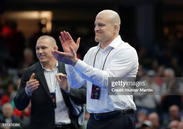 Head coach Cael Sanderson of the Penn State Nittany Lions celebrates Vincenzo Joseph winning the 165 pound championship during session six of the...
