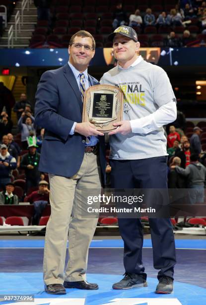 Head coach Cael Sanderson of the Penn State Nittany Lions is presented with the Division I Coach of the Year award during the awards ceremony of the...