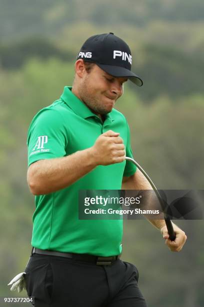 Tyrrell Hatton of England reacts to a missed birdie putt on the 14th green during the fourth round of the World Golf Championships-Dell Match Play at...