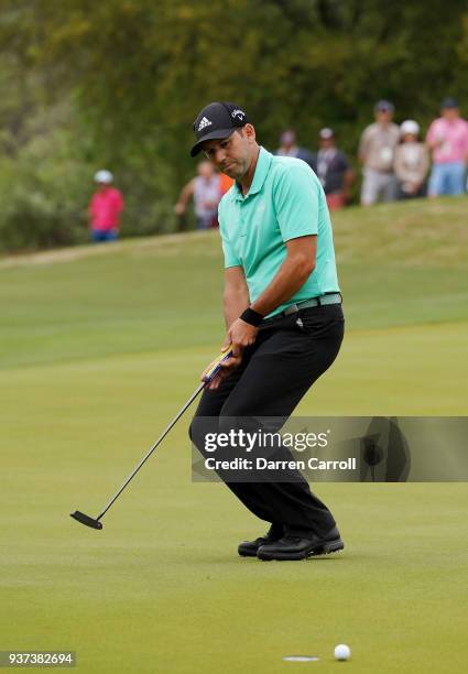 Sergio Garcia of Spain reacts to a missed putt on the 16th green during the fourth round of the World Golf Championships-Dell Match Play at Austin...
