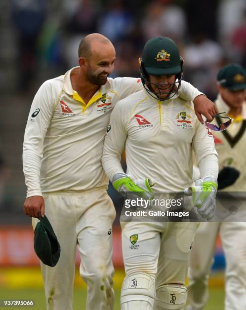 Nathan Lyon and Tim Paine of Australia during day 3 of the 3rd Sunfoil Test match between South Africa and Australia at PPC Newlands on March 24,...