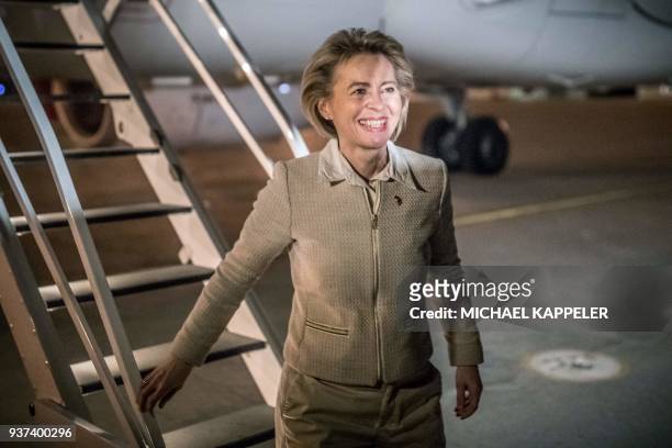German Defence Minister Ursula von der Leyen descends the gangway of the A319 airplane of the German Air Force as she arrives in the military camp in...