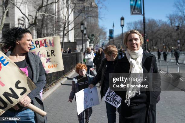 Cynthia Nixon, actress and 2018 New York gubernatorial Democratic candidate, right, walks on Central Park West ahead of the March For Our Lives in...