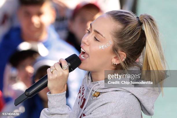 Miley Cyrus performs "The Climb" during the March for Our Lives rally on March 24, 2018 in Washington, DC. Hundreds of thousands of demonstrators,...