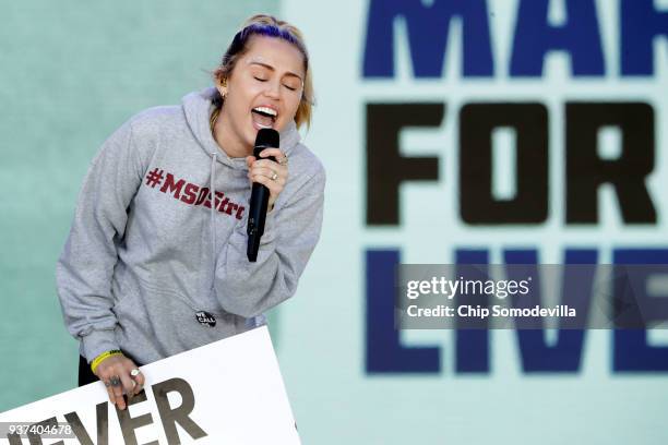 Miley Cyrus performs "The Climb" during the March for Our Lives rally on March 24, 2018 in Washington, DC. Hundreds of thousands of demonstrators,...