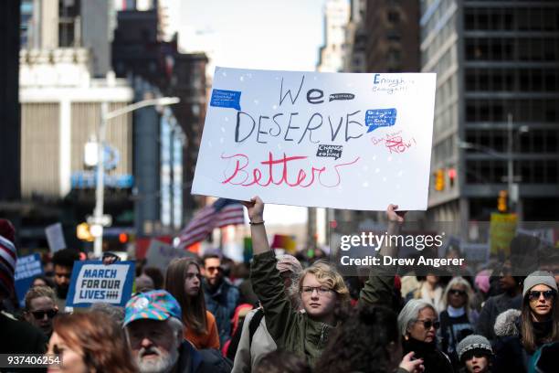 Protestors march down Sixth Avenue during the March For Our Lives, March 24, 2018 in New York City. Thousands of demonstrators, including students,...