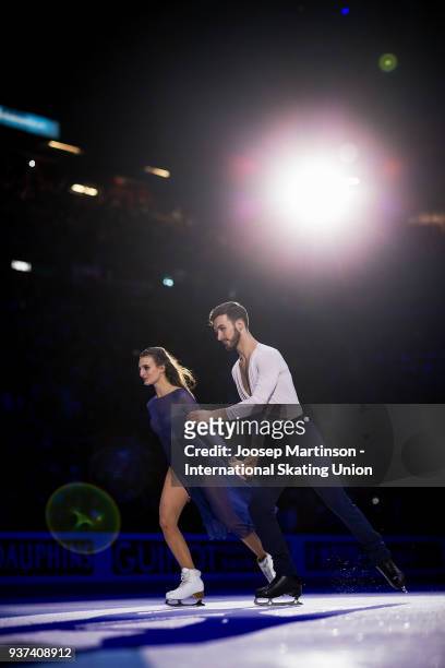 Gabriella Papadakis and Guillaume Cizeron of France react in the Ice Dance medal ceremony during day four of the World Figure Skating Championships...