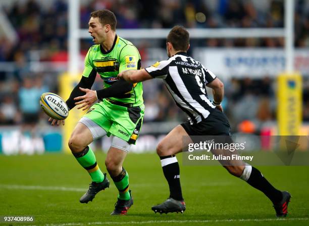 George North of Northampton passes ahead of Michael Young of Newcastle during the Aviva Premiership match between Newcastle Falcons and Northampton...