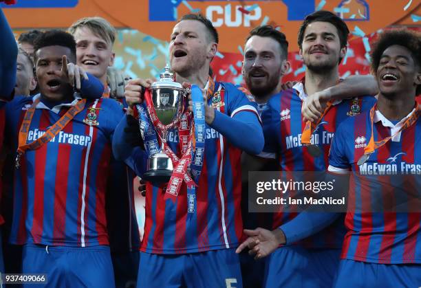 Gary Warren of Inverness Caledonian Thistle lifts the trophy during the IRN-BRU Scottish Challenge Cup Final between Dumbarton FC v Inverness...