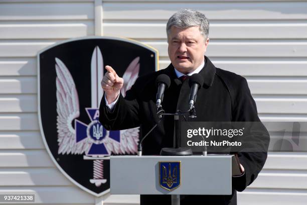 Ukrainian President Petro Poroshenko delivery a speechs during training of special units of the SBU on the proving ground near Kiev, Ukraine on 24...