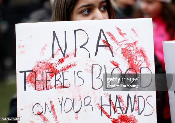 Protestor takes part in the March for Our Lives rally on March 24, 2018 in Chicago, Illinois. More than 800 March for Our Lives events, organized by...