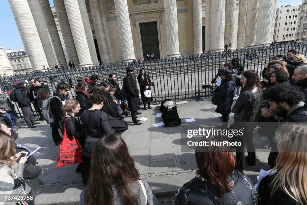 Teachers, parents and students lay down a coffin as a symbol of the death of the French national Education at the base of the Pantheon in Paris, on...