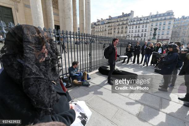 Teachers, parents and students lay down a coffin as a symbol of the death of the French national Education at the base of the Pantheon in Paris, on...