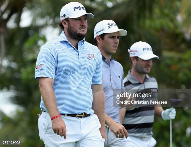 Tom Lovelady, Matt Atkins and David Lingmerth of Sweden wait to tee off on the seventh tee during round three of the Corales Puntacana Resort & Club...