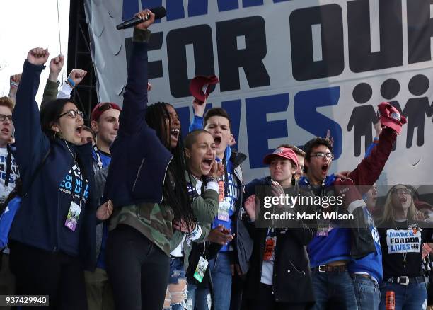 Students from Marjory Stoneman Douglas High School stand together at the end of the March for Our Lives rally on March 24, 2018 in Washington, DC....