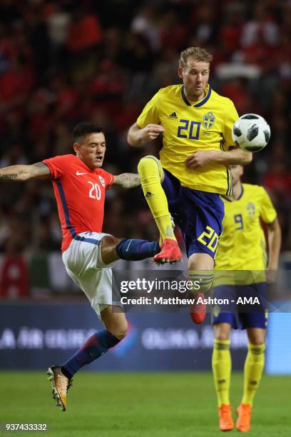 Charles Aranguiz of Chile and Ola Toivonen of Sweden during the International Friendly match between Sweden and Chile at Friends arena on March 24,...