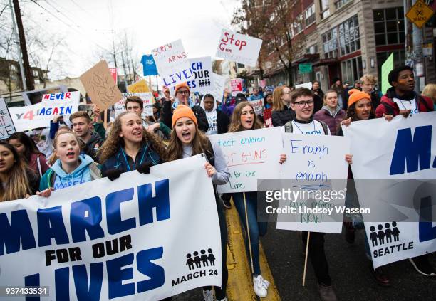 Students lead the march down Pine Street during the March for Our Lives rally on March 24, 2018 in Seattle, Washington. More than 800 March for Our...