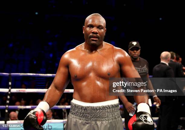 Dereck Chisora celebrates after knocking down Zakaria Azzouzi in the second round in the Heavyweight contest at the O2 Arena, London.