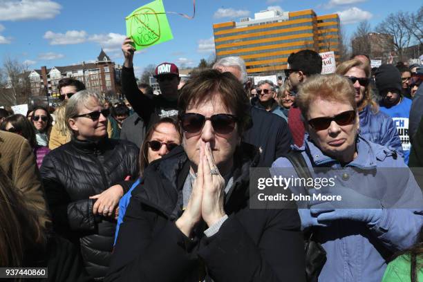Stamford resident Jane Levene, who said her neffew was killed by gun violence, listens during the March for Our Lives rally on March 24, 2018 in...