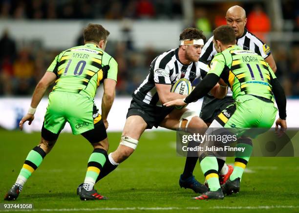 Sean Robinson of Newcastle is stopped by George North of Northampton during the Aviva Premiership match between Newcastle Falcons and Northampton...