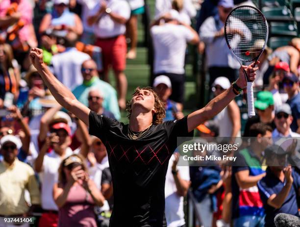 Alexander Zverev of Germany celebrates winning 6-4 1-6 7-6 against Daniil Mevedev of Russia on Day 6 of the Miami Open Presented by Itau at Crandon...