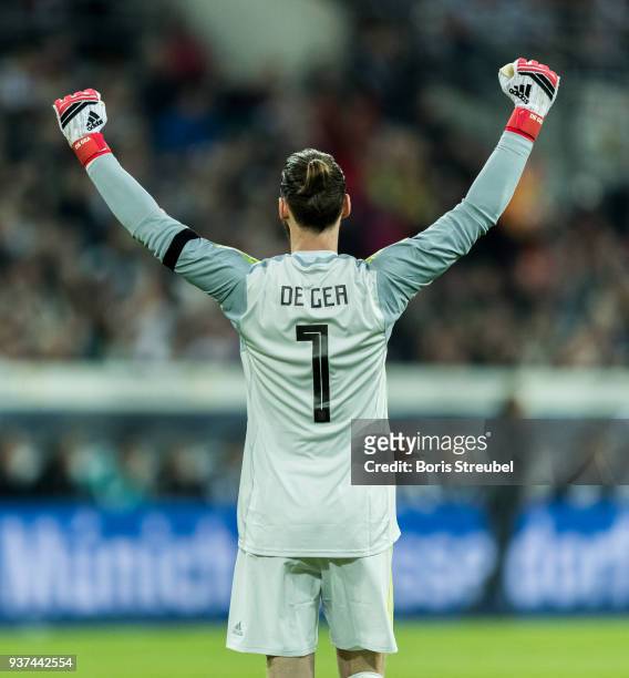 Goalkeeper David de Gea of Spain celebrates during the international friendly match between Germany and Spain at Esprit-Arena on March 23, 2018 in...
