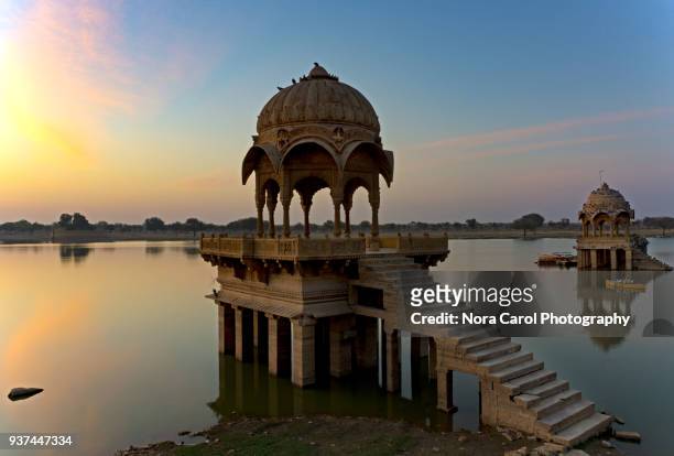 gadi sagar temple at gadisar lake in jaisalmer - jaisalmer stock pictures, royalty-free photos & images