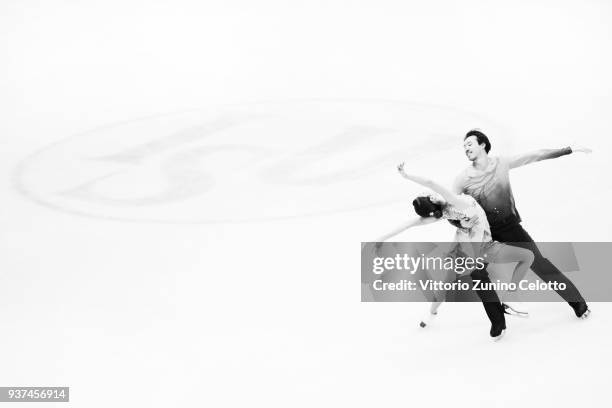 Kana Muramoto and Chris Reed of Japan compete in the Ice Dance Free Dance during day four of the World Figure Skating Championships at Mediolanum...