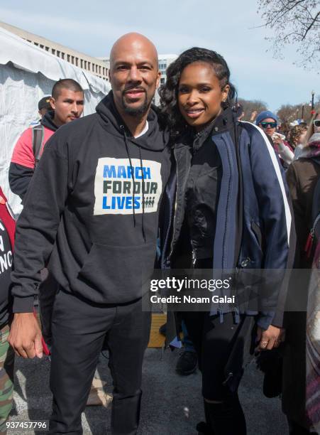 Common and Jennifer Hudson pose backstage at March For Our Lives on March 24, 2018 in Washington, DC.