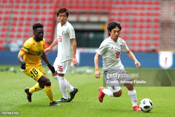 Nouha Dicko of Mali and Shoya Nakajima of Japan during the International friendly match between Japan and Mali on March 23, 2018 in Liege, Belgium.