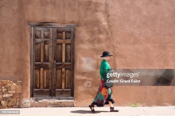 well dressed woman touring town. - santa fe new mexico stock pictures, royalty-free photos & images
