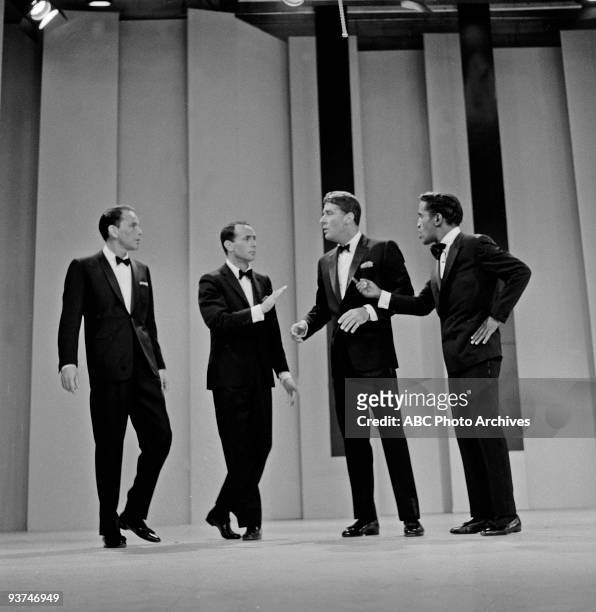 Frank Sinatra with "Rat Pack" members, Joey Bishop, Peter Lawford and Sammy Davis Jr.