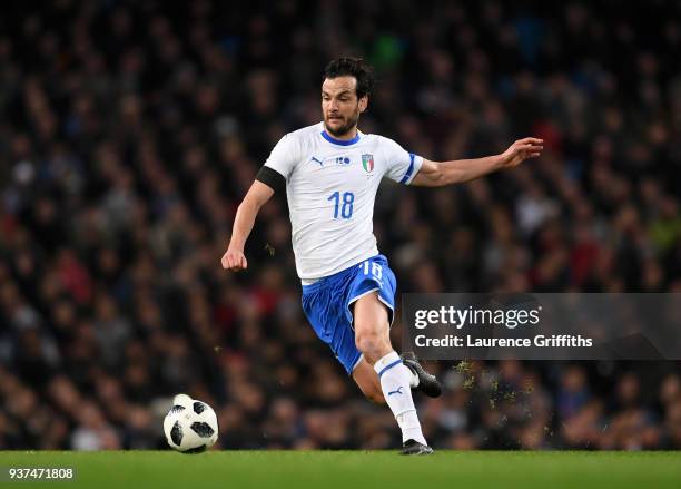 Marco Parolo of Italy runs with the ball during the International Friendly match between Italy and Argentina at Etihad Stadium on March 23, 2018 in...